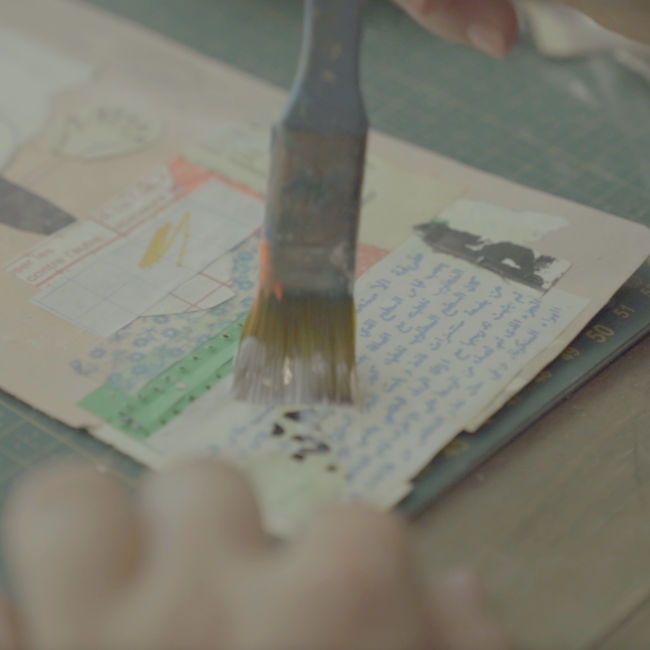 Visual expression combining collage, drawing, and textile elements. Visual expression combining collage, drawing, and textile elements.