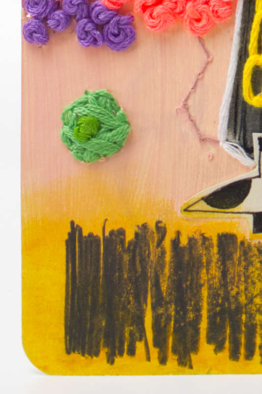 Handmade paper collage featuring intricate embroidery and textured mixed media layers. Handmade paper collage featuring intricate embroidery and textured mixed media layers.