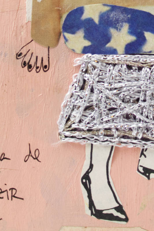 Handmade paper collage featuring intricate embroidery and textured mixed media layers.