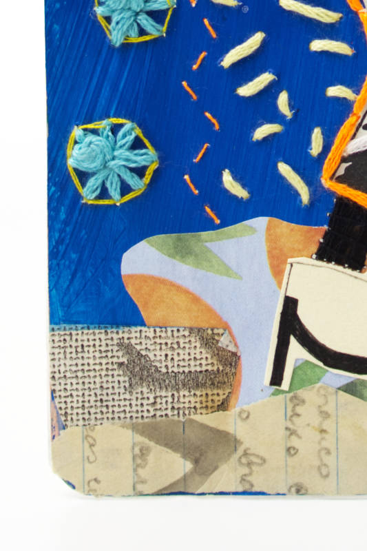 Intricate layered paper collage with embroidery thread and mixed media elements. Intricate layered paper collage with embroidery thread and mixed media elements.