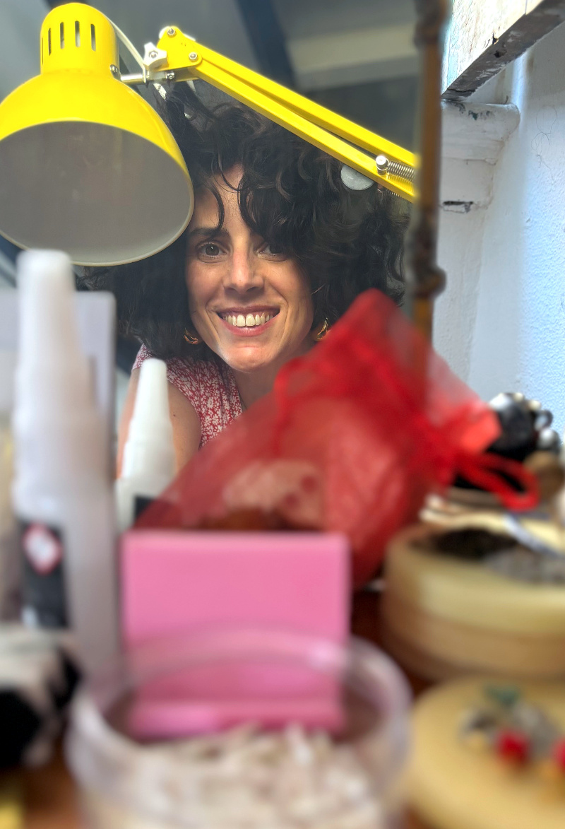 Self-portrait reflected in a mirror on a colleague's worktable in the studio, 2025 Self-portrait reflected in a mirror on a colleague's worktable in the studio, 2025