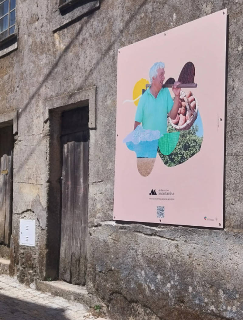 Photographic collage on pink background mounted on stone wall, Videmonte, Guarda